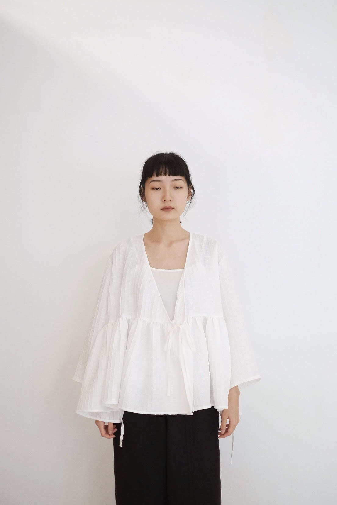 KĒKI LAYER BLOUSES WITH STRAPPING