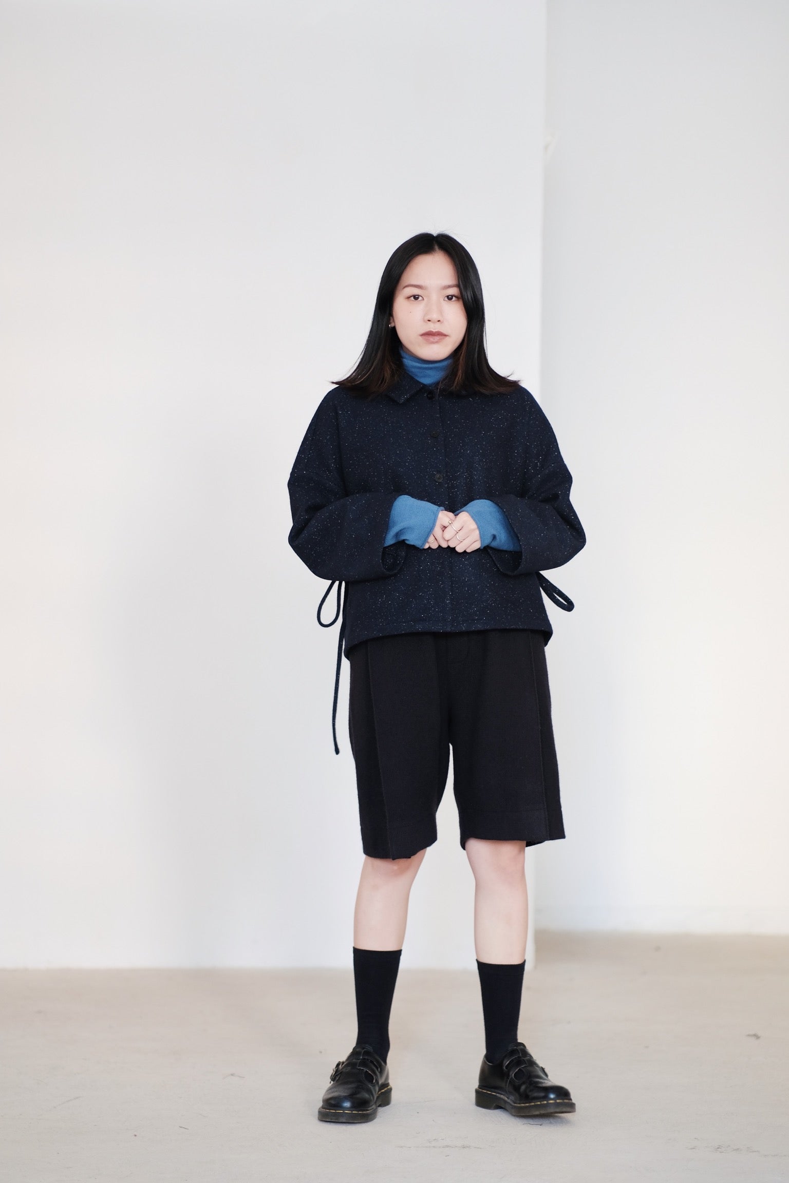 ARIA PLEAT-DETAIL SHORTS IN WOOL (BLACK) PRE-ORDER