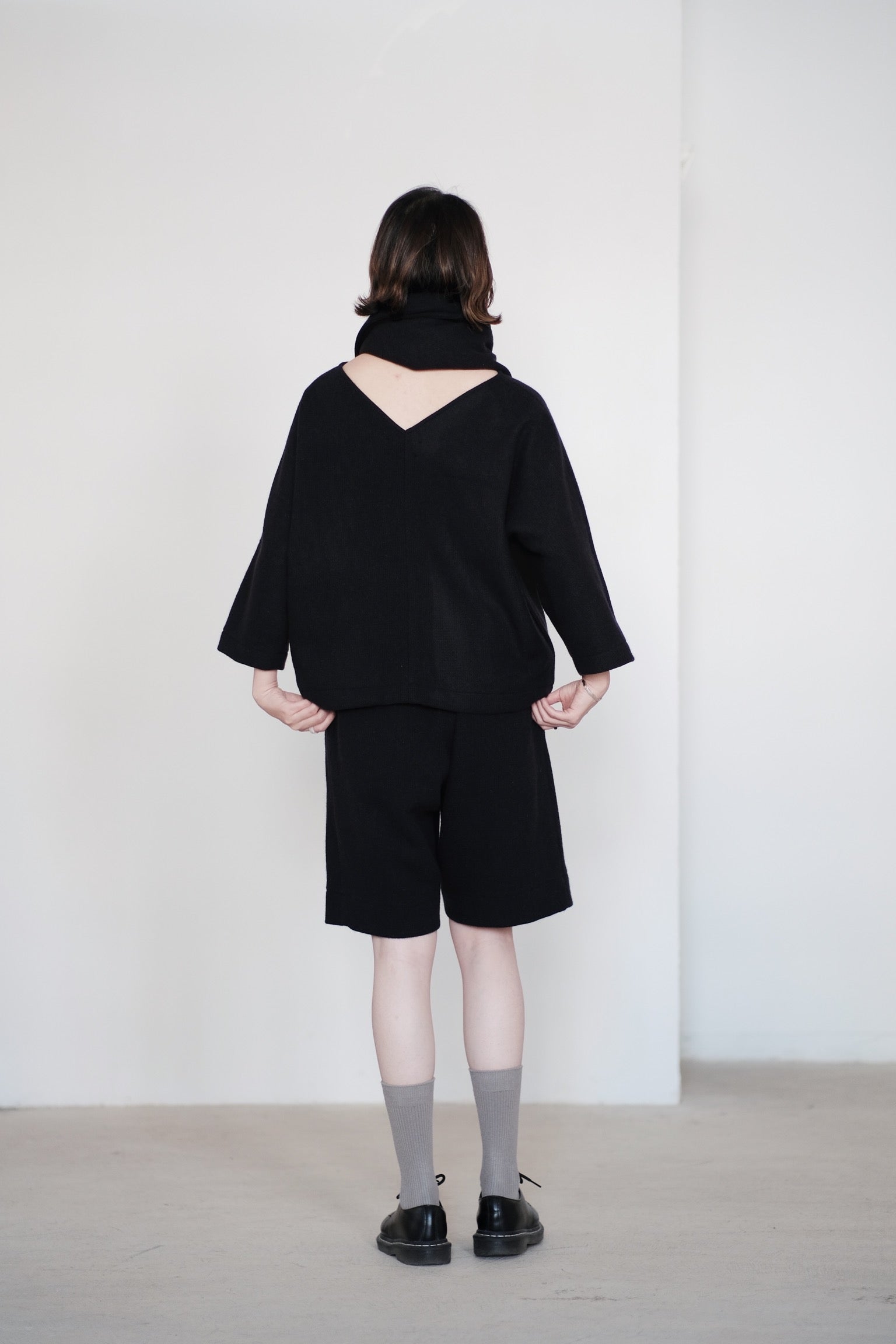 ARIA PLEAT-DETAIL SHORTS IN WOOL (BLACK) PRE-ORDER