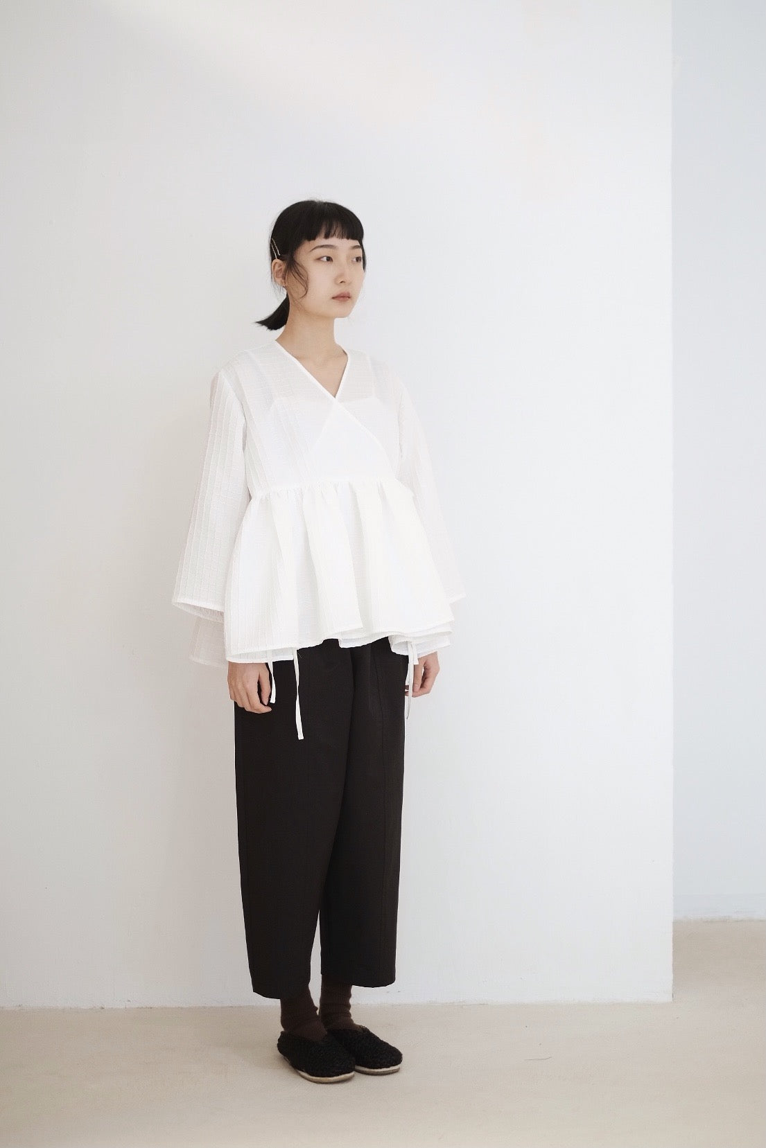 KĒKI LAYER BLOUSES WITH STRAPPING