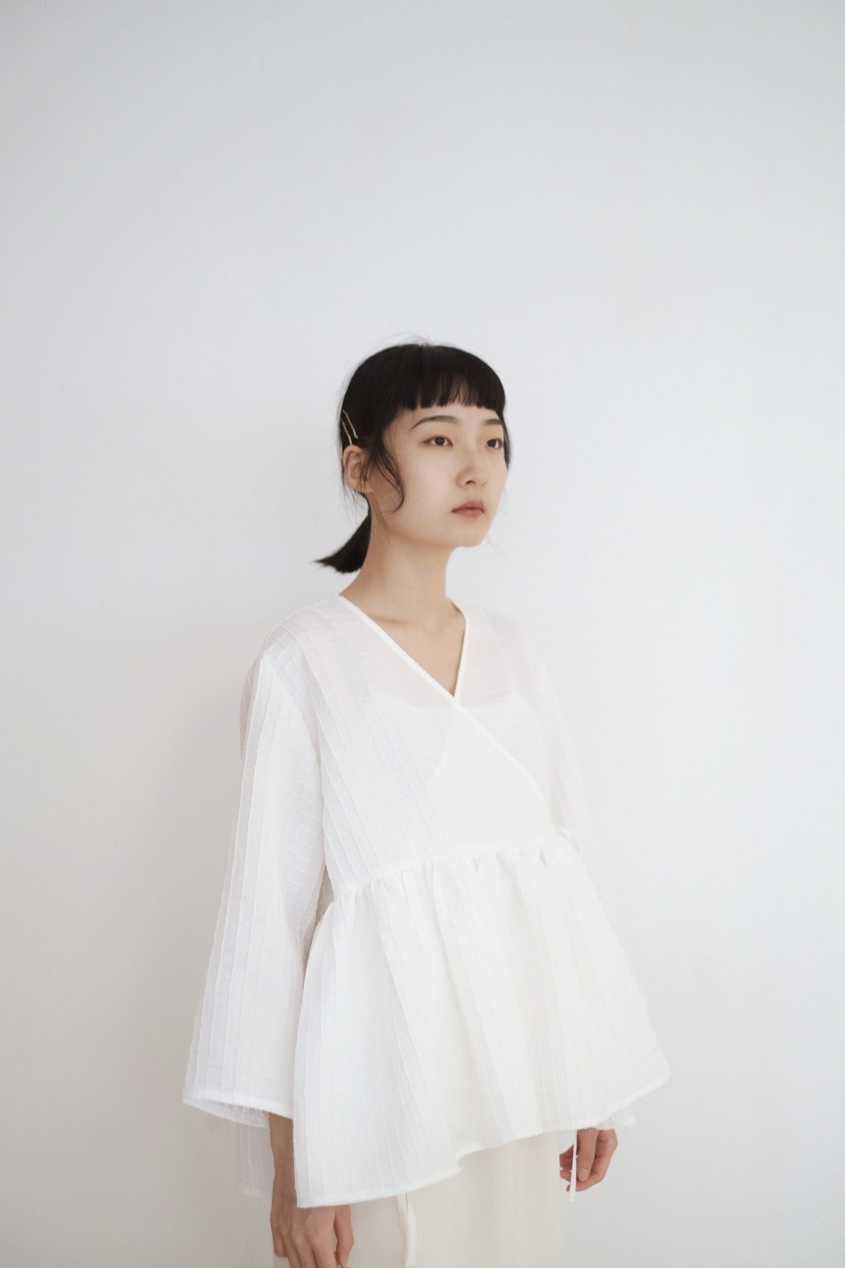 KĒKI LAYER BLOUSES WITH STRAPPING