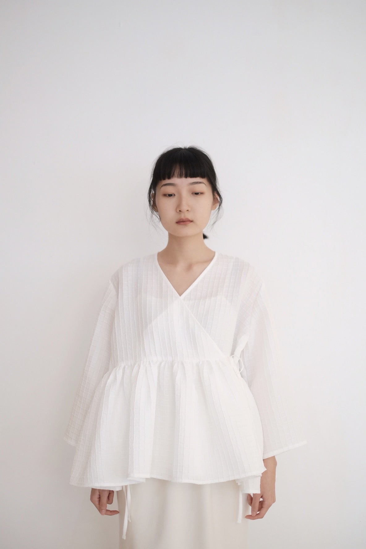 KĒKI LAYER BLOUSES WITH STRAPPING